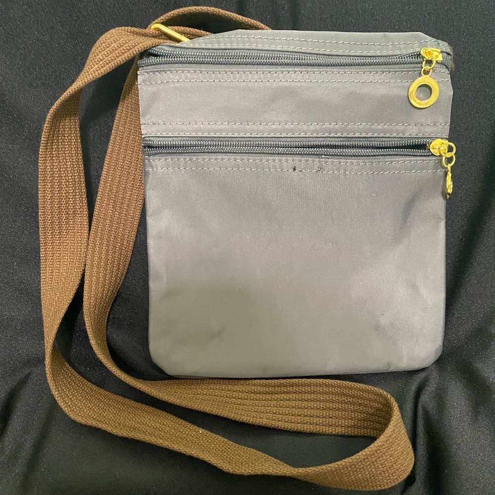 Gray handbag lightweight and water resistant brand new with tags.